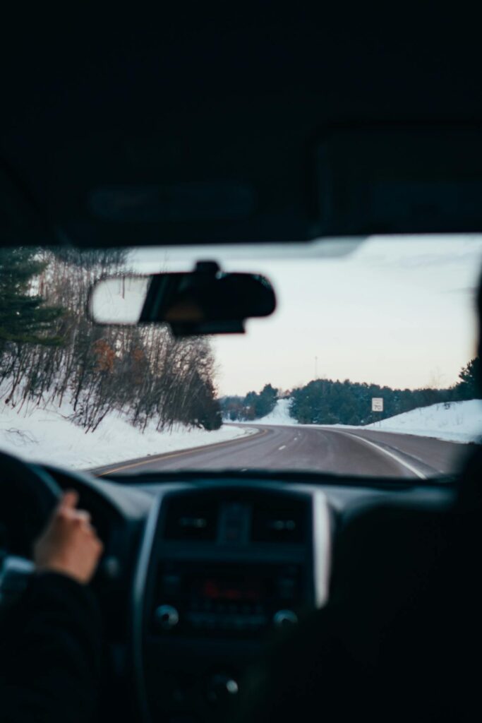 Winter highway drive representing restricted driving after DUI suspension